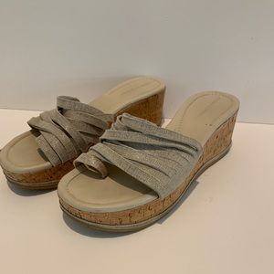 Donald J Pliner!  Super cute silver sandals.